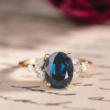 Custom Laurel engagement ring oval center stone with diamond accents
