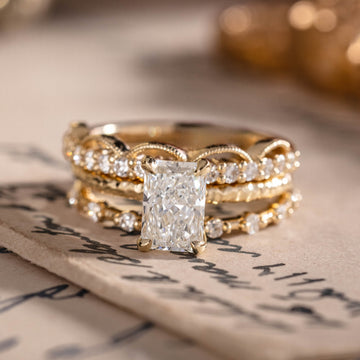 custom 3 Piece engagement ring and stackable bands set in 14K yellow gold
