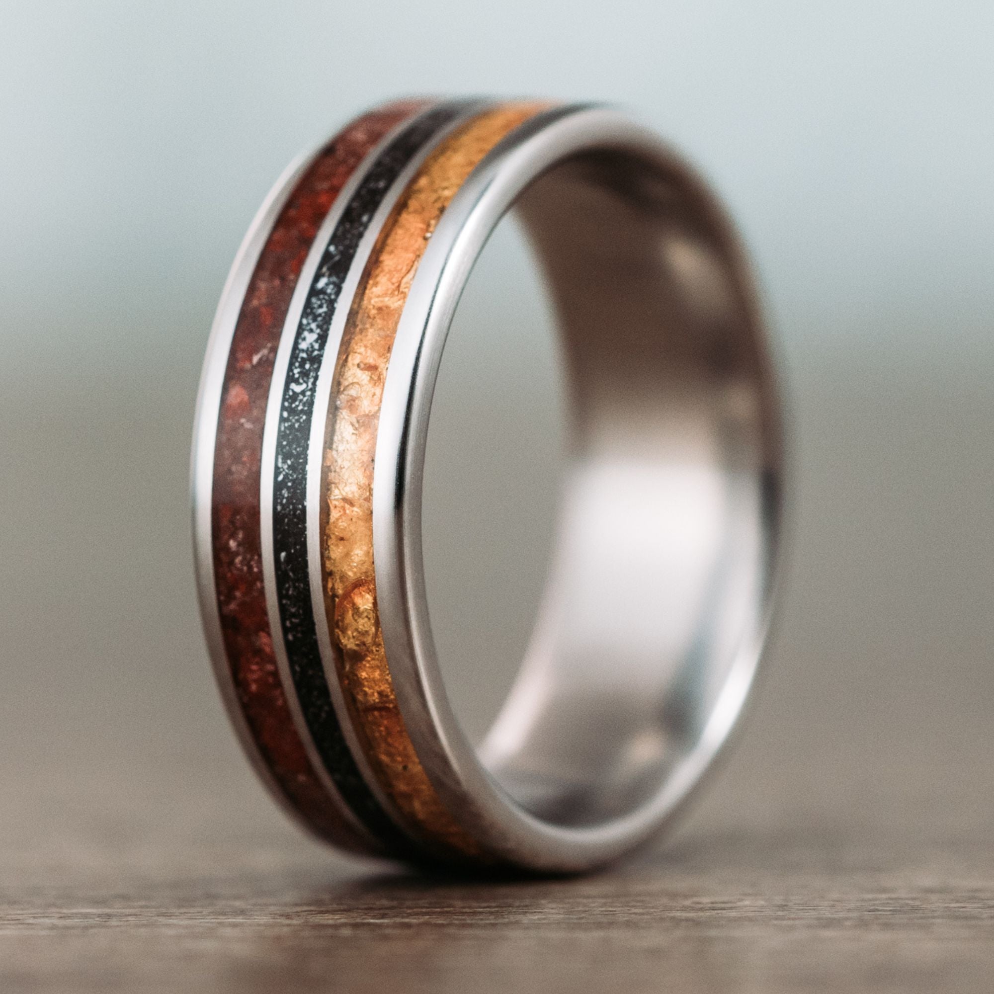 Titanium Wedding Band with Dinosaur Bone, Meteorite, & Fossilized Amber