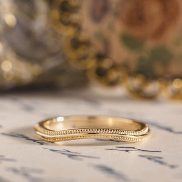 the-alouette-solid-gold-contour-wedding-band-with-milgrain-accents
