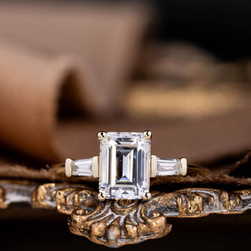 the-charlotte-three-stone-emerald-cut-diamond-engagement-ring