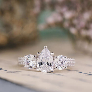 the-elenor-three-stone-pear-two-row-diamond-engagement-ring