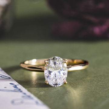 the-lily-solitaire-oval-diamond-engagement-ring-nature-inspired-setting