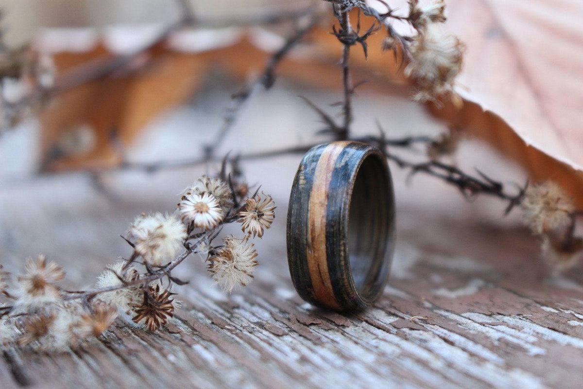 Weathered whiskey barrel ring with natural inlay