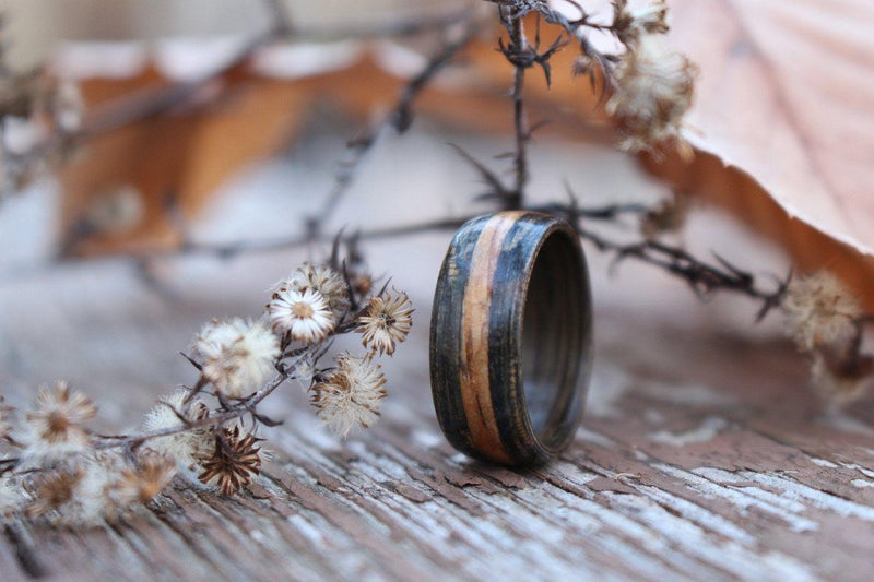 Weathered whiskey barrel ring with natural inlay
