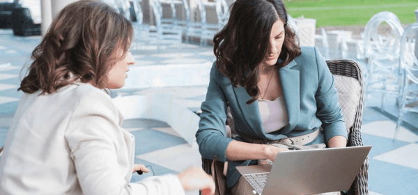 Wedding planner helping the bride