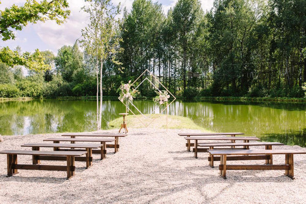 eco friendly wedding venue outside near pond