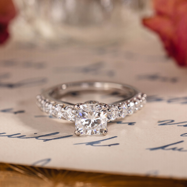 Cushion cut lab-grown diamond engagement ring in 10K white gold with moissanite pavé accents