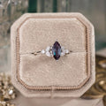 Marquise lab-grown alexandrite engagement ring in 10K white gold with diamond accents