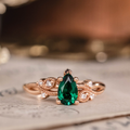Pear cut lab-grown emerald engagement ring in 14K rose gold