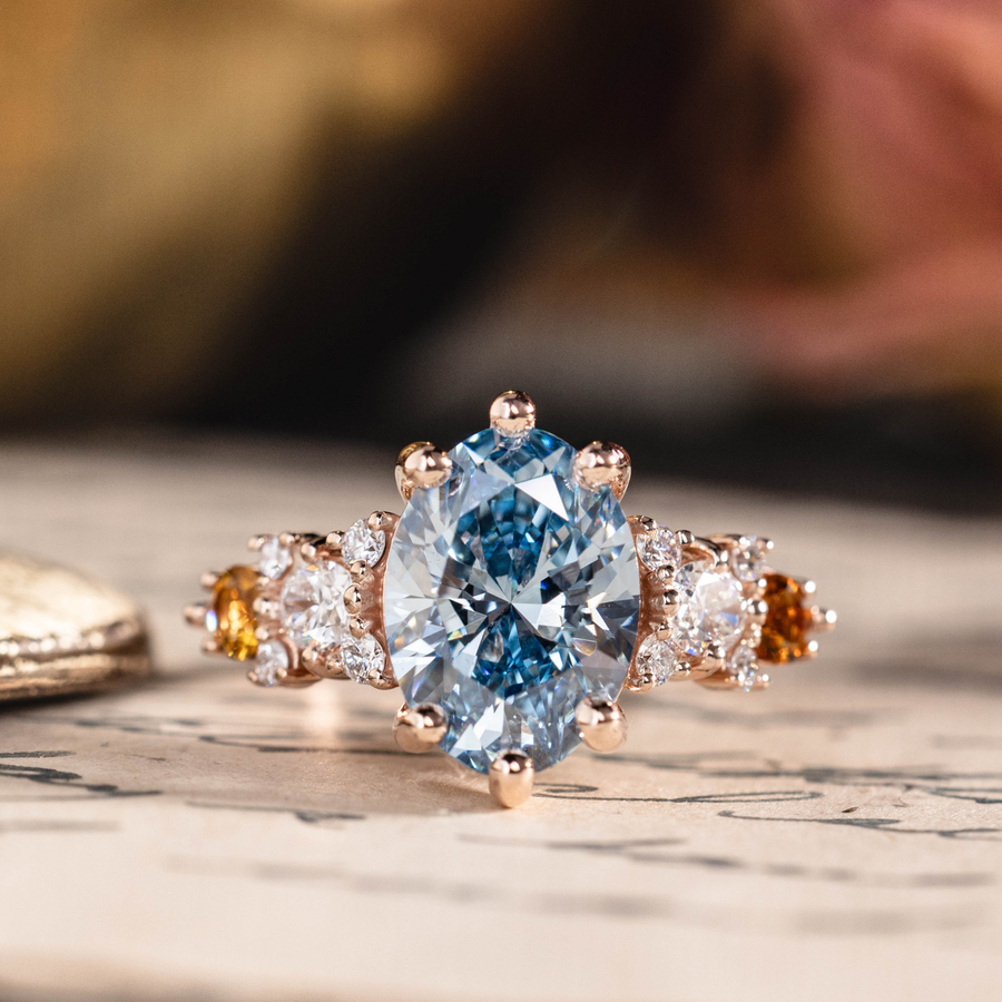 Oval fancy vivid blue lab-grown diamond engagement ring in 14K rose gold