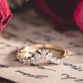 Contour wedding band with marquise, pear, and round diamond accents in 10K yellow gold