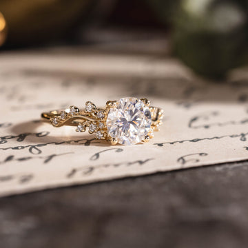 Custom Moissanite round engagement ring with floral accents