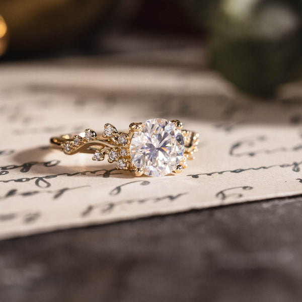 Custom Moissanite round engagement ring with floral accents