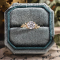 Custom Moissanite round engagement ring with floral accents