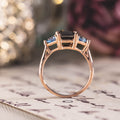 Custom Emerald-Cut Black Onyx Engagement Ring with Aquamarine Accents in 14K Rose Gold