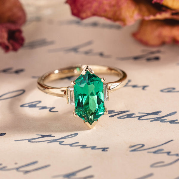 Elongated Hexagon Emerald Engagement Ring with Diamond Accents