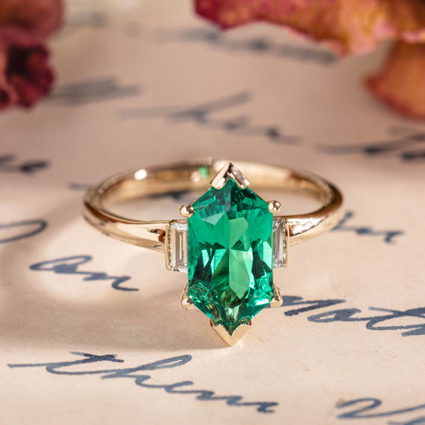 Elongated Hexagon Emerald Engagement Ring with Diamond Accents