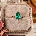 Elongated Hexagon Emerald Engagement Ring with Diamond Accents