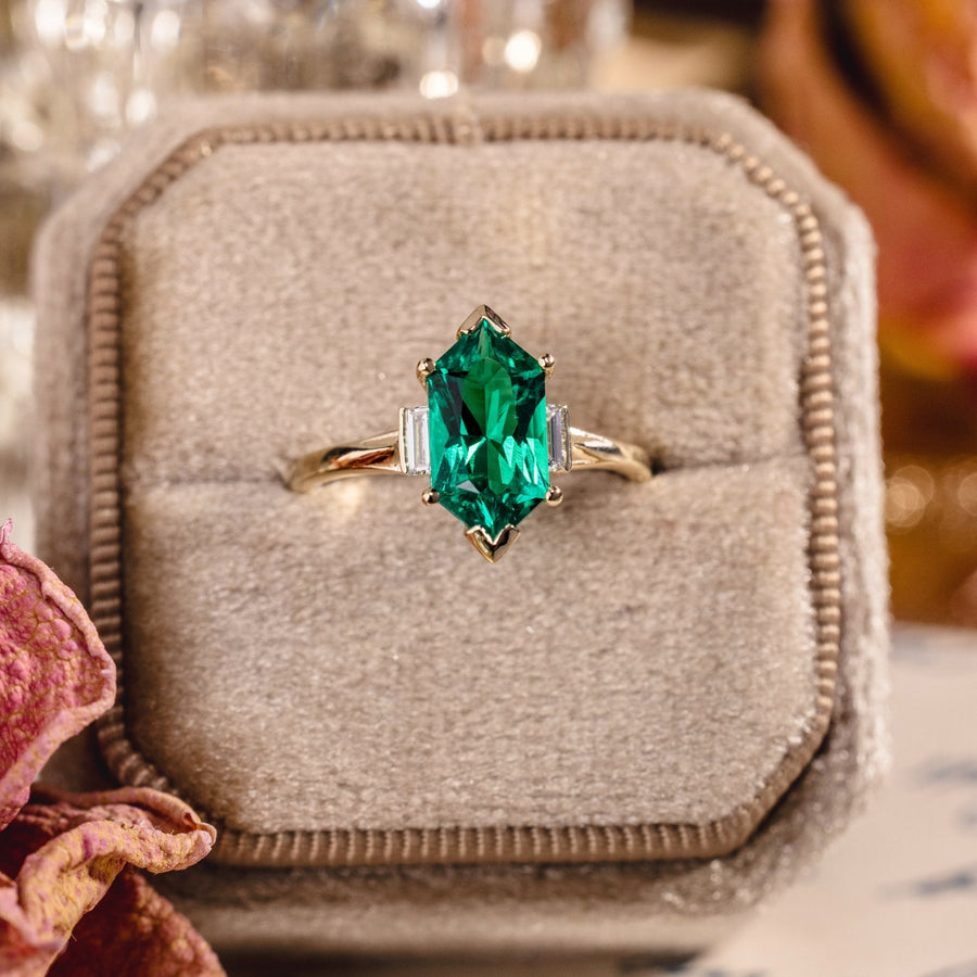 Elongated Hexagon Emerald Engagement Ring with Diamond Accents