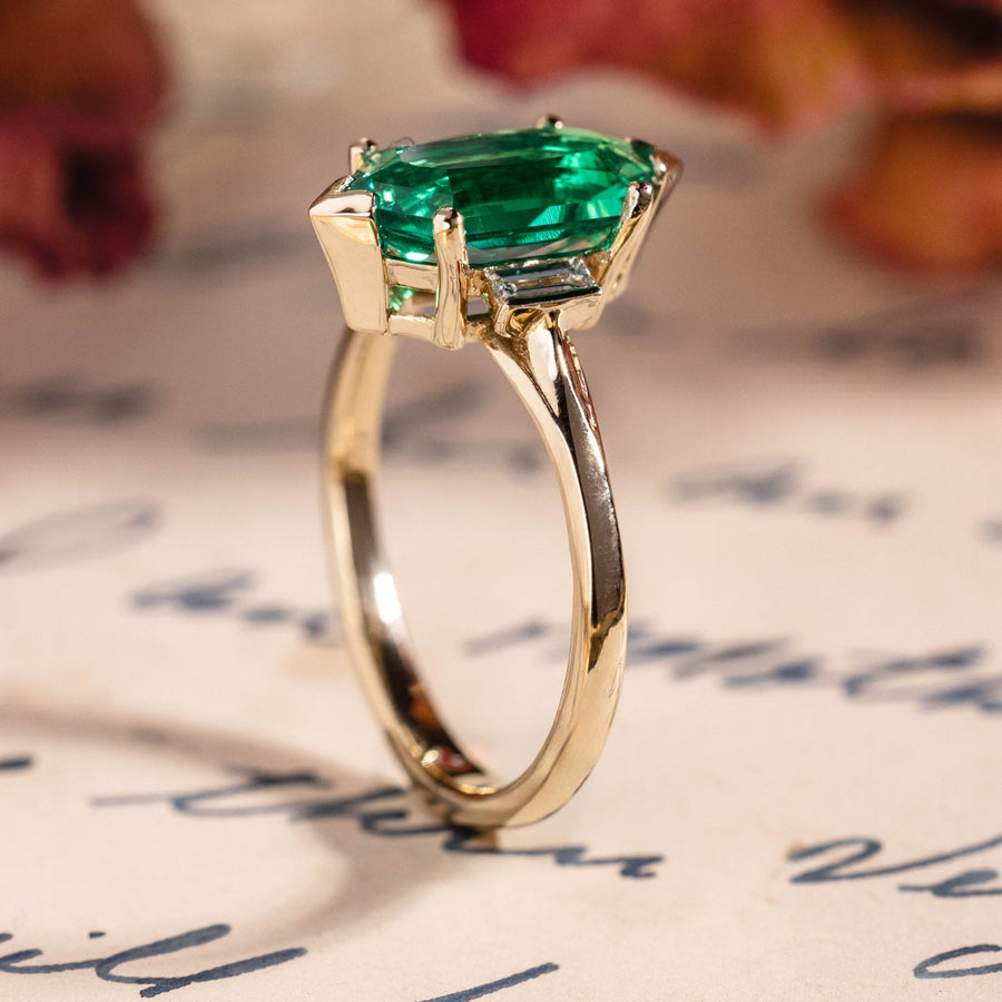 Elongated Hexagon Emerald Engagement Ring with Diamond Accents