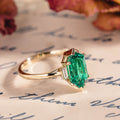 Elongated Hexagon Emerald Engagement Ring with Diamond Accents