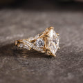Custom elongated hexagon diamond floral ring with floral acccents