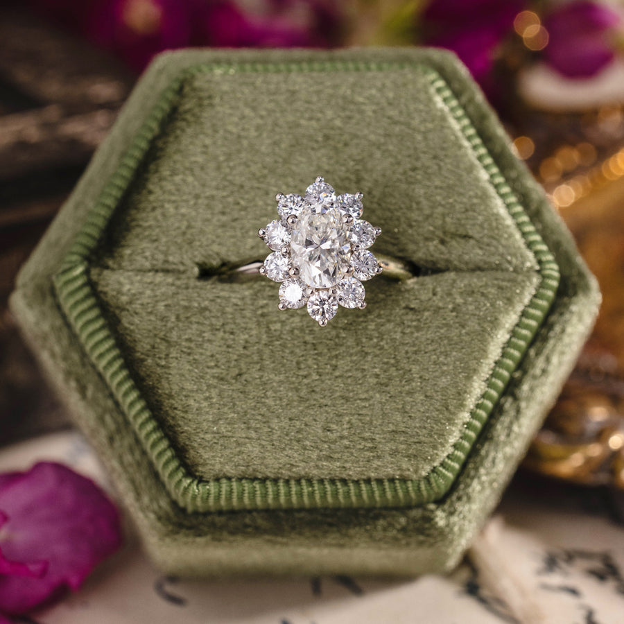 Custom platinum diamond ring with floral style halo