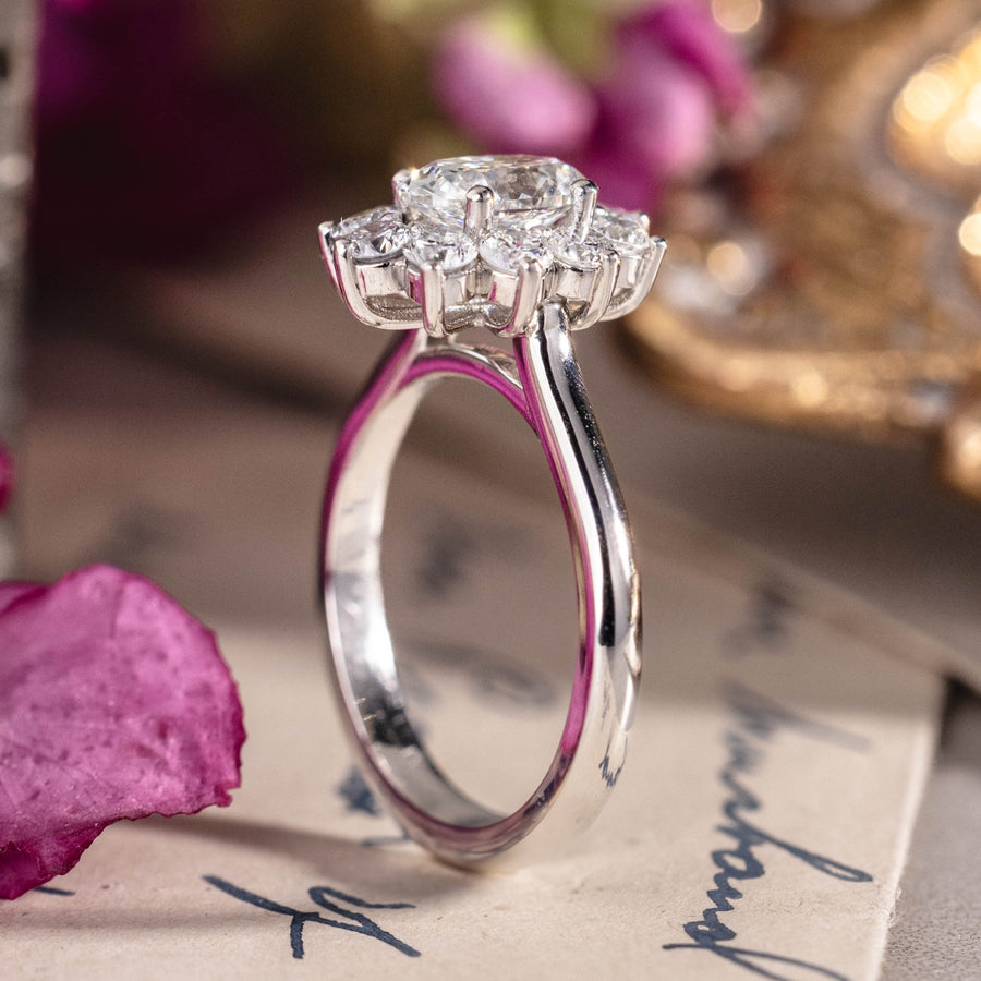 Custom platinum diamond ring with floral style halo