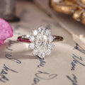 Custom platinum diamond ring with floral style halo