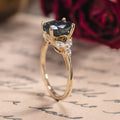 Custom Laurel engagement ring oval center stone with diamond accents