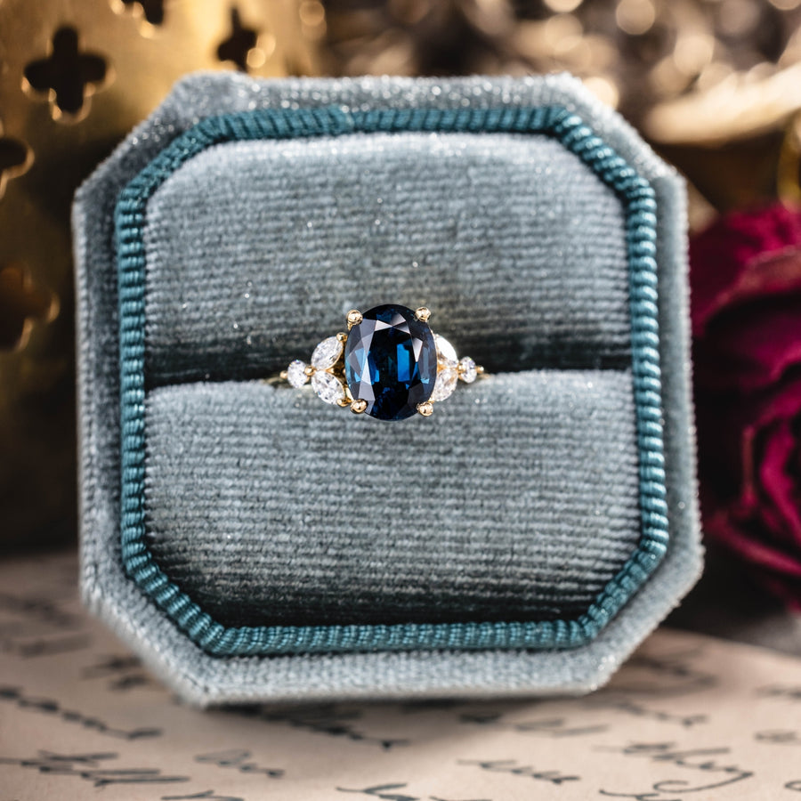 custom-oval-teal-sapphire-engagement-ring-inspired-by-the-laurel