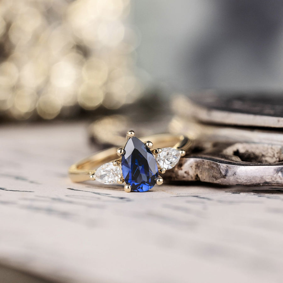 Custom Pear-Cut Blue Sapphire Three-Stone Engagement Ring in 10K Yellow Gold