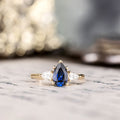 Custom Pear-Cut Blue Sapphire Three-Stone Engagement Ring in 10K Yellow Gold