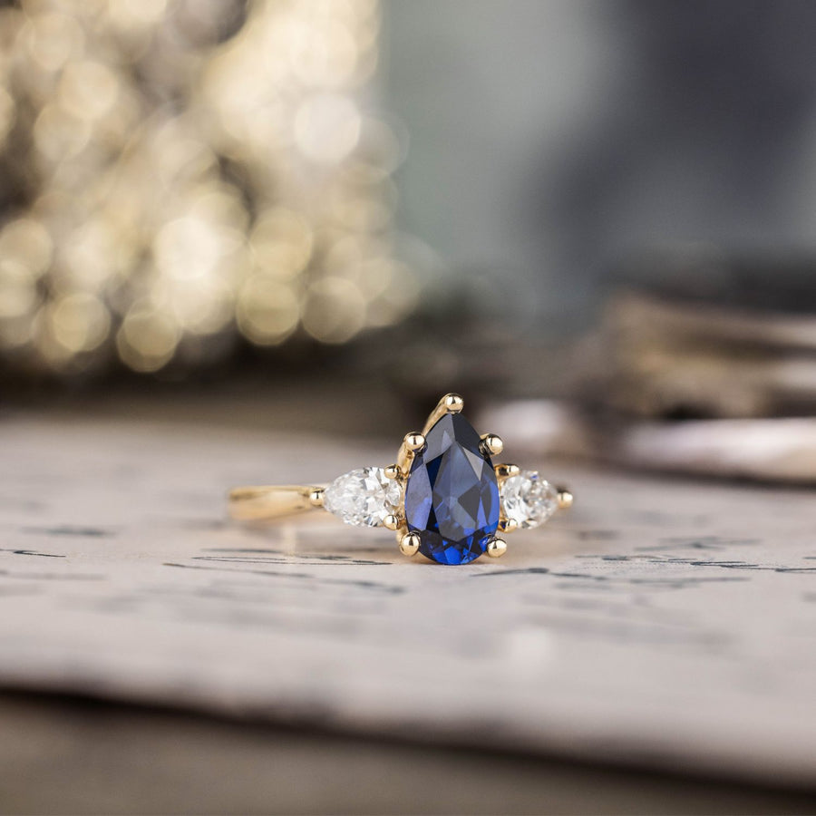 Custom Pear-Cut Blue Sapphire Three-Stone Engagement Ring in 10K Yellow Gold