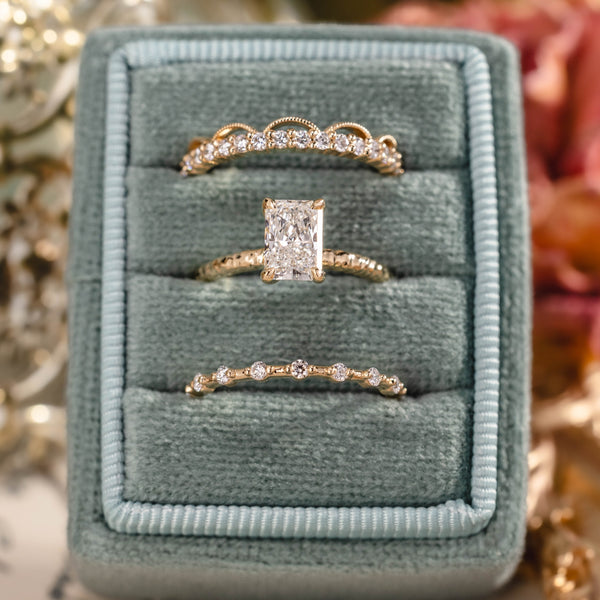 custom 3 Piece engagement ring and stackable bands set in 14K yellow gold