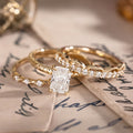 custom 3 Piece engagement ring and stackable bands set in 14K yellow gold