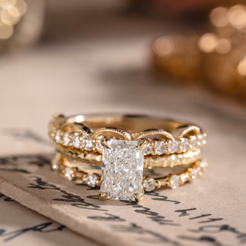 custom 3 Piece engagement ring and stackable bands set in 14K yellow gold
