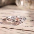 White gold engagement ring with peach morganite