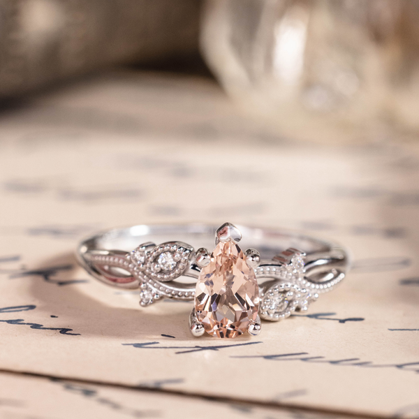 White gold engagement ring with peach morganite
