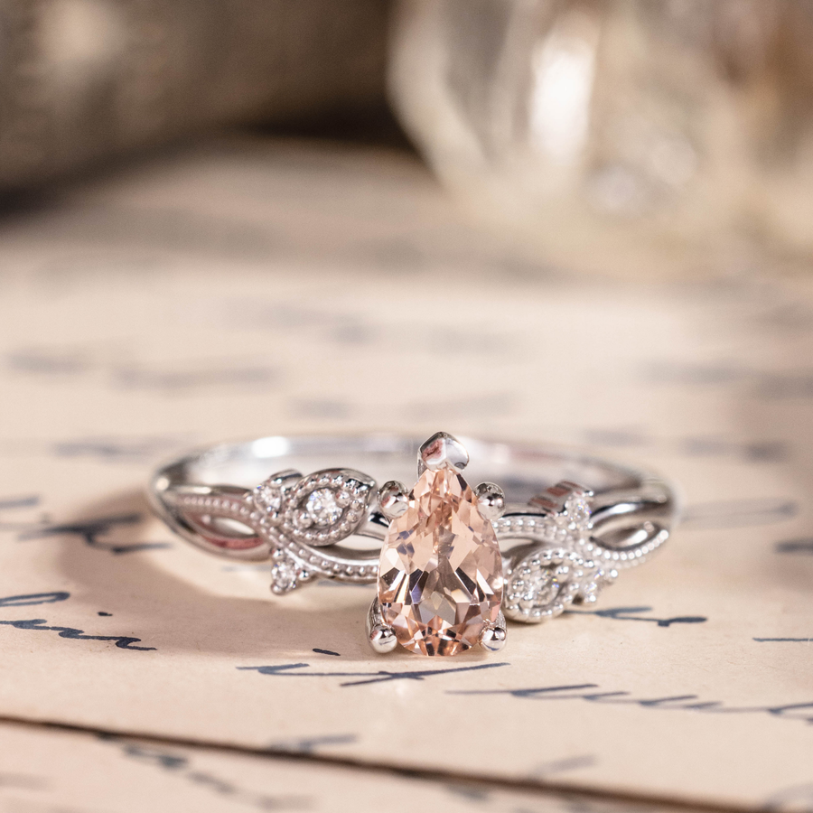 White gold engagement ring with peach morganite