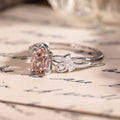 White gold engagement ring with peach morganite