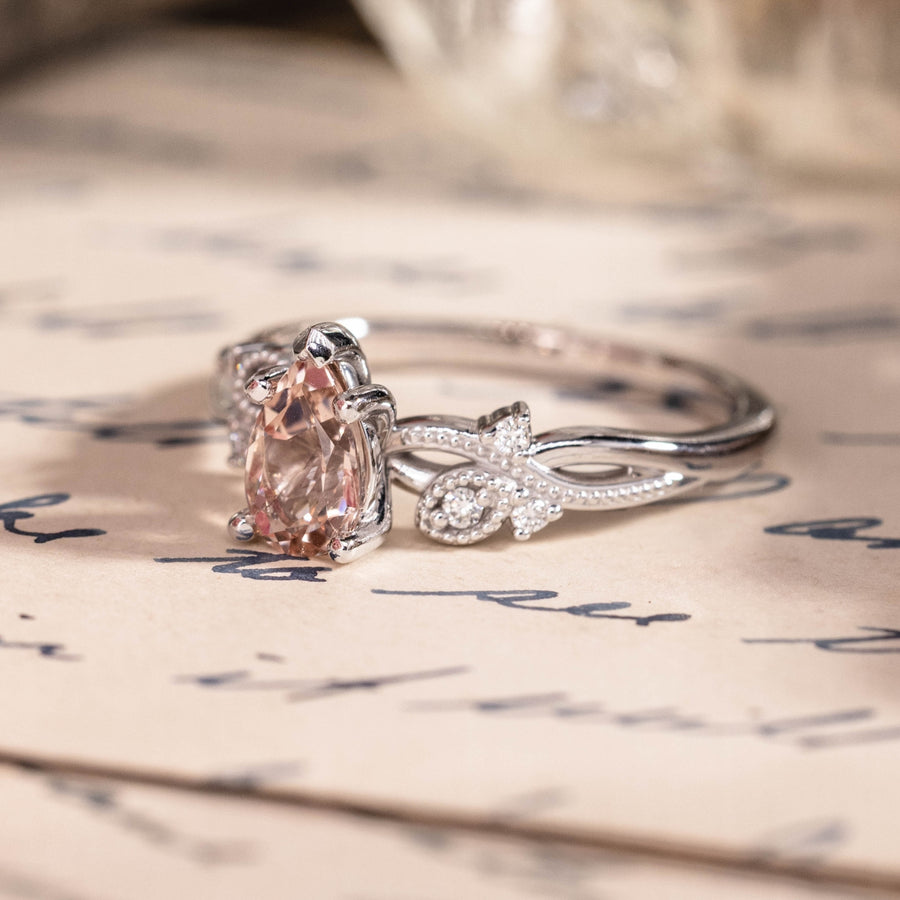 White gold engagement ring with peach morganite
