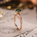 Pear cut lab-grown emerald engagement ring in 14K rose gold