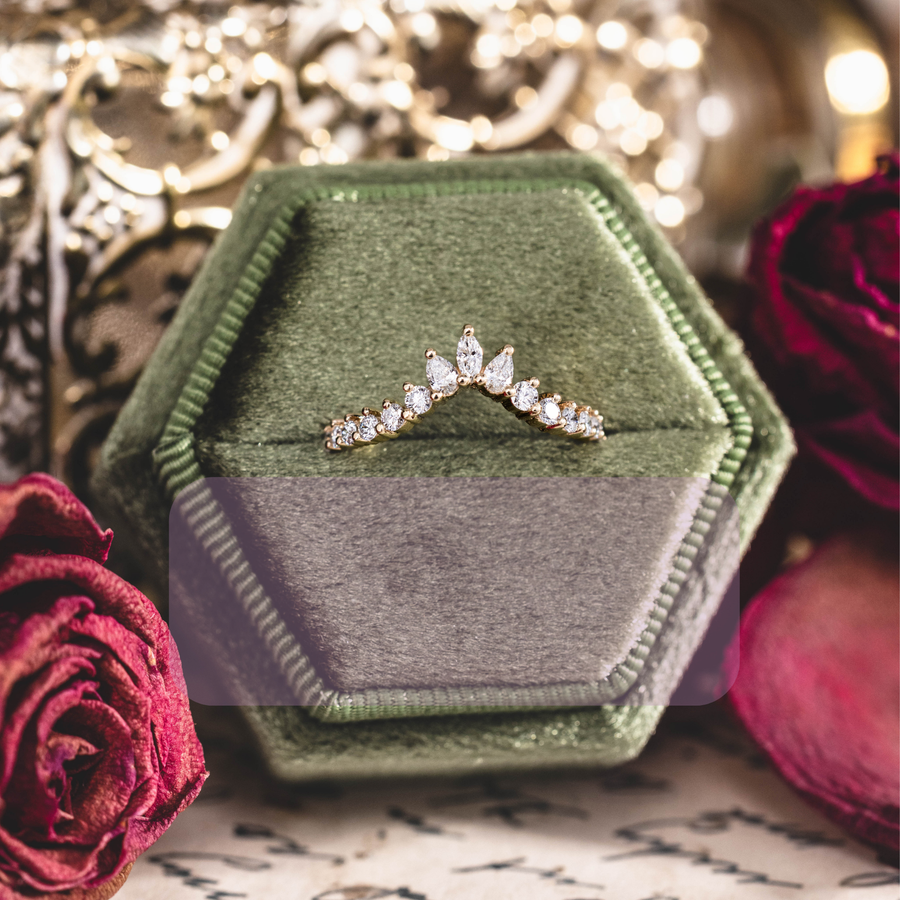 Contour wedding band with marquise, pear, and round diamond accents in 10K yellow gold