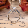 Cushion cut lab-grown diamond engagement ring in 10K white gold with moissanite pavé accents