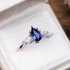 blue-sapphire-pear-cut-three-stone-engagement-ring-with-diamond-accents_10