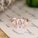 Emerald-cut-diamond-three-stone-engagement-ring-trillion-diamond-accent-stones-the-ingrid-rustic-and-main