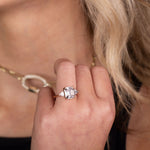 Emerald-cut-diamond-three-stone-engagement-ring-trillion-diamond-accent-stones-the-ingrid-rustic-and-main