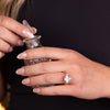 Emerald-cut-diamond-three-stone-engagement-ring-trillion-diamond-accent-stones-the-ingrid-rustic-and-main